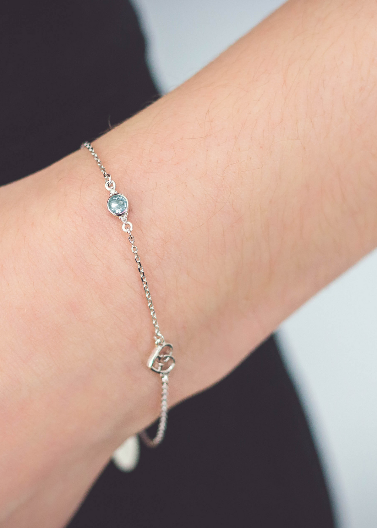 NATURAL AQUAMARINE AND TWO NATURAL DIAMOND MARCH BRACELET SILVER