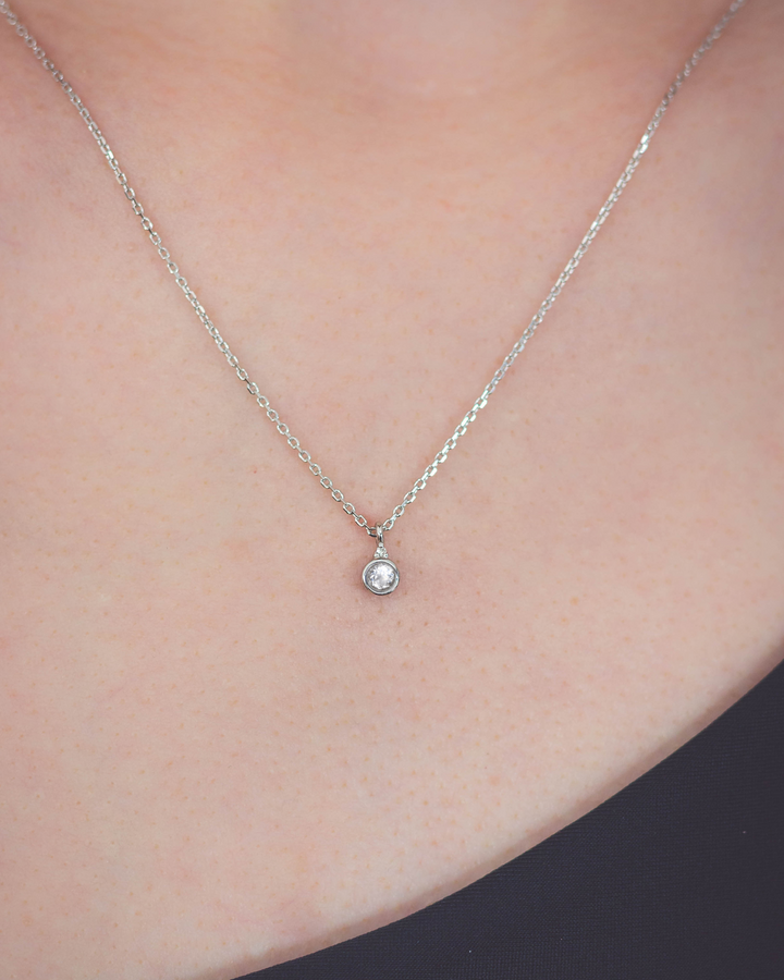 NATURAL TOPAZ AND DIAMOND APRIL PENDANT SILVER